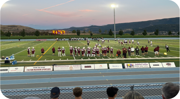 Footballspiel bei Sonnenuntergang